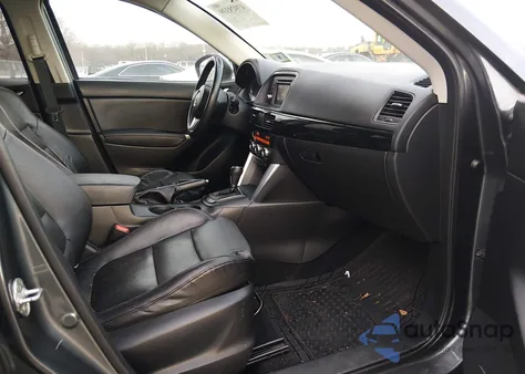 2013 Mazda Cx-5 Grand Touring z USA, uszkodzony, nr VIN JM3KE4DE7D0132256